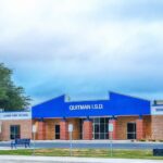 Quitman Proud Blue Bands Logo